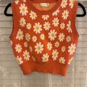 ALTAR’D STATE | GENTLY WORN | ORANGE CROP SWEATERVEST W WHITE & YELLOW DAISIES |